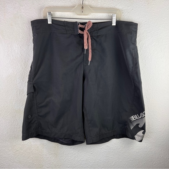 BILLABONG QUAD PLATINUM STRETCH SWIM TRUNKS. Gunmetal gray. Velcro pocket - Picture 1 of 6